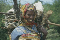 Women carrying basket of firewood on her back near Baidoa.