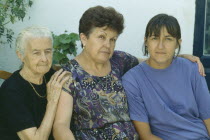 Portrait of grandmother  daughter and grand-daughter.  Three generations. Andalusia