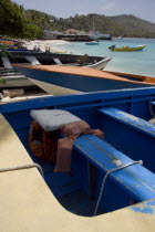 Fishing boats on the beach in Britannia Bay with Basils Bar beyond