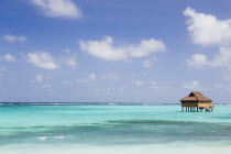 Amrita Spa offshore treatment rooms off Godahl Beach at Raffles Resort