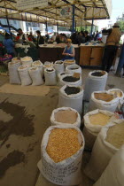 Sacks of lentils pulses rice and wheat at the fresh produce marketAgricultural produce available products