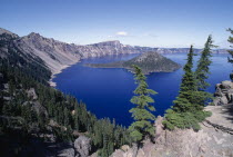 View over water filled crater formed after the erruption of Mount Mazama with small island in the middle