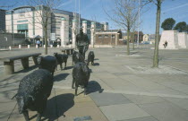 Shepherd and Sheep sculpture by artist Deborah Brown  in the grounds of the Waterfront Hall Lanyon PlaceLanyon Place sheep in the Road