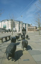 Shepherd and Sheep sculpture by artist Deborah Brown  in the grounds of the Waterfront Hall Lanyon PlaceLanyon Place sheep in the Road