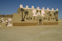 General view of museum building. Mural on facade painted by Badr