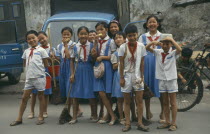 Young Pioneers. Group of smiling children in uniform.
