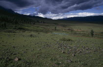 Landscape at the foot of Jade Dragon Snow Mountain  also known as Mount Satseto