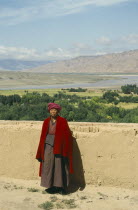 Tibetan monk living in remote area by the Yellow River near Guide.