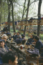 Songbirds in cages at a tea house.