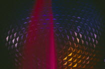 Walt Disney World Epcot Center Spaceship Earth at night with illuminated fountain in foreground. **Editorial Use Only**