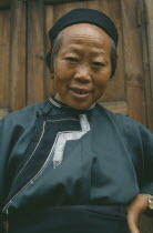 Naxi lady in traditional clothes