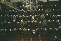 Looking down on Muslims at prayer