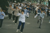 Mass Tai Chi exercises in a park