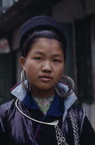 Portrait of Muong girl wearing large hooped earringsHmuongHmong