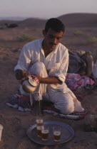 Berber guide pouring tea
