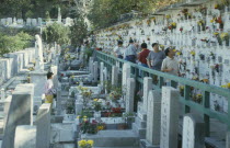 People visiting Qing Ming Festival graveyard