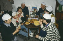 Muslim family celebrating the end of Ramadan.