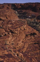 View over ridge of red rock canyon landscape