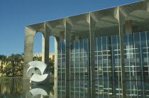 Hamarati Palace  housing the Foreign Office  with modern sculpture on water outside