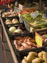 Fruit and vegetables on sale at a market stall in the town of Rouille.