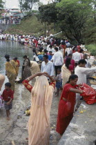 Crowds prepare offerings beside the Grand Bassin lake during the Maha Shivaratree festival in honour of the Hindu god Siva.