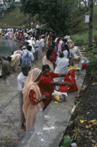 Crowds prepare offerings beside the Grand Bassin lake during the Maha Shivaratree festival in honour of the Hindu god Siva.