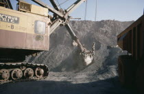 Extraction of iron ore by heavy machinery in mine.West Africa  Zourat