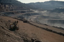 Iron mine.  Machinery working on terraces.West Africa  Zourat