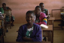 Students at St Francis girls secondary school  seated at desks in classroom.