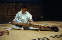 Gayageum stringed instrument player.