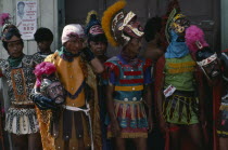 Moriones Festival passion play re-enactment of the story of the Roman soldier Longinus and the crucifixtion of Jesus.  Local men dressed as Roman soldiers with masks.   Holy Week  Easter