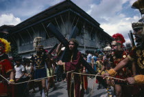 Moriones Festival passion play re-enactment of the story of the Roman soldier Longinus and the crucifixtion of Jesus on Good Friday.  Holy Week  Easter