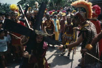 Moriones Festival passion play re-enactment of the story of the Roman soldier Longinus and the crucifixtion of Jesus on Good Friday.  Holy Week  Easter