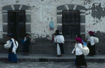 Women returning from cemetery after praying for the dead on Easter Sunday.Holy Week
