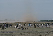 Dust storm approaching Dinka cattle market.