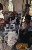 Women market traders selling bread