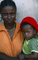 Camp for Sierra Leonean refugees. Mother and child
