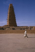 The Grand Mosquee.  Originally built in 1515 and then renovated and rebuilt in 1844 in the original style with wooden support beams protruding from single minaret.Agadez Moslem