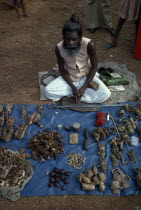 Ayurvedic medicine stall selling roots  seeds and traditional remedies.