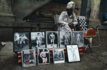 Magic elixir seller on street stall.