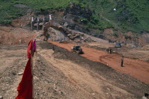 Reconstruction of dam damaged by 1995 floods.