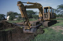 Dutch company ILACO pilot project for drainage canal.  Caterpillar operated by Dinka driver