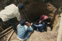 Lining newly dug well near Jinja funded by Comic Relief.