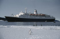 Tourist ship Marco Polo with Adelie penguins at Cape Royds.