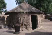 Traditional thatched mud hut.