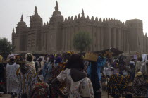 Busy market scene with Grand Mosque behind.   Moslem