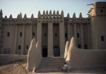 The Grand Mosque.  Part view of exterior with plastered mud walls. Moslem