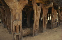Detail of Dogon Togu na or case a palabres  open sided meeting place of the village elders with thatched roof of millet stalks supported by carved wooden posts.