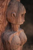 Detail of wooden Dogon carving of female figure.