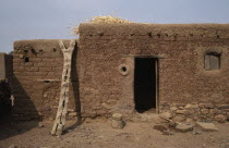 Mud brick village home.